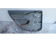 Recambio de guarnecido puerta trasera derecha para dacia logan 1.4 cat referencia OEM IAM   