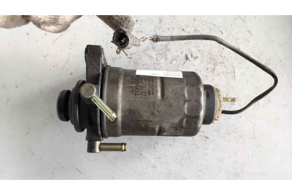 Recambio de filtro gasoil para toyota yaris 1.4 turbodiesel cat referencia OEM IAM 233036401 1861000653 