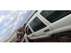 Recambio de puerta trasera izquierda para jeep gr.cherokee (wj/wg) 4.0 cat referencia OEM IAM   