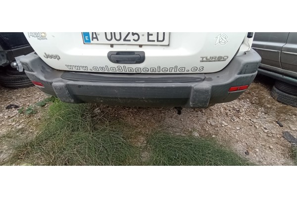 Recambio de paragolpes trasero para jeep gr.cherokee (wj/wg) 4.0 cat referencia OEM IAM   
